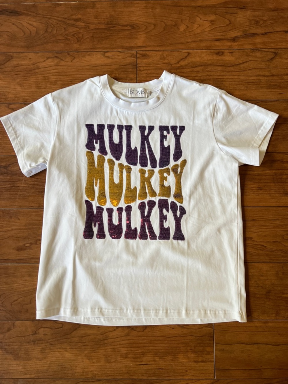 Women's White Mulkey Graphic Short-Sleeve Tee by BOMB